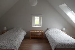 De zolder-slaapkamer met 4 slaapplaatsen